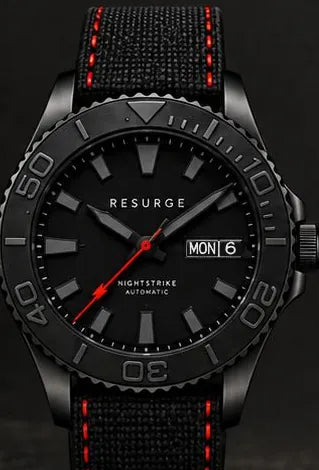 Prototype render close-up of a red NIGHTSTRIKE from the Oct 15 master, with white dots around the dial edge